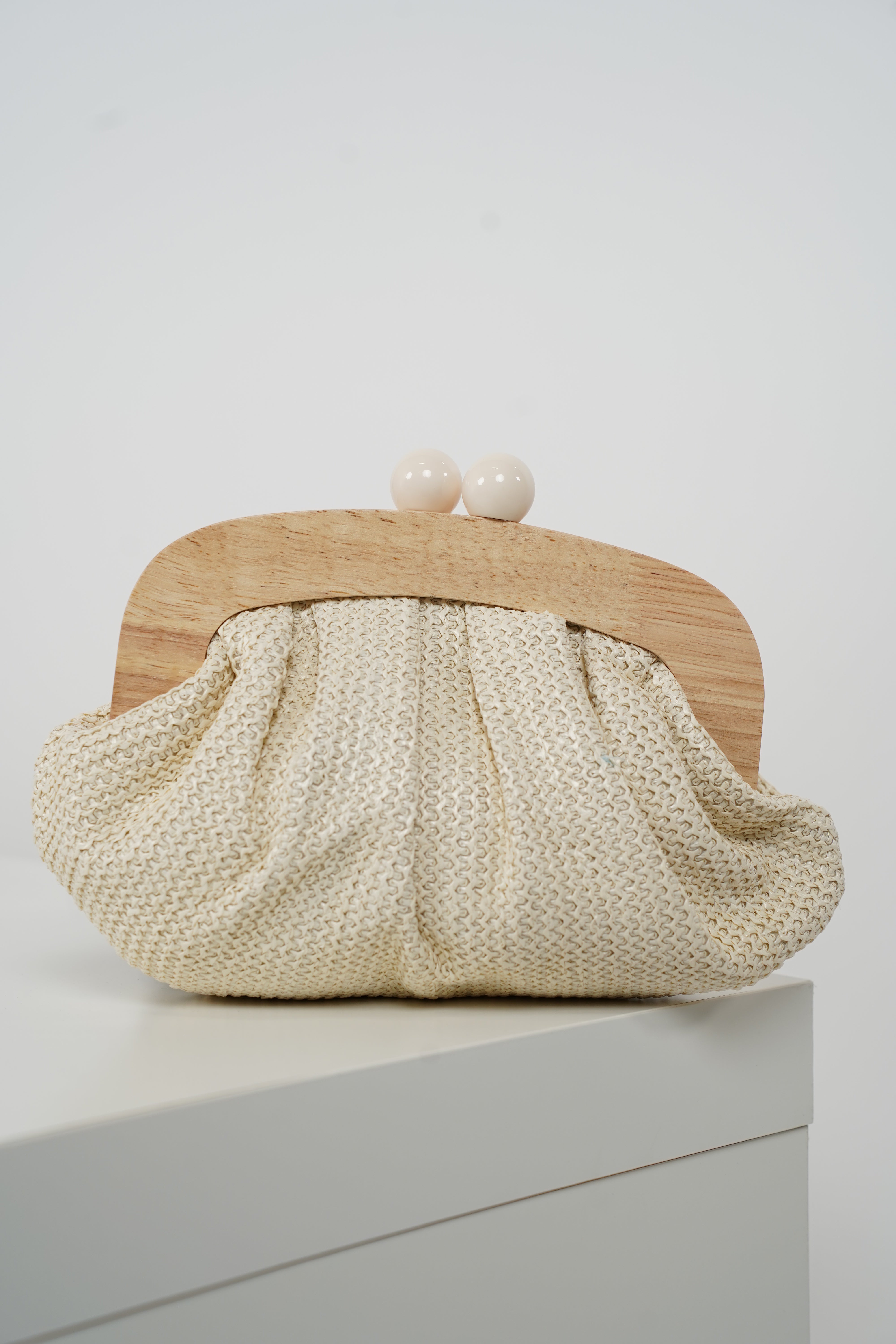 Elvina Beach Clutch – Woven Pink Clasp Clutch with Natural Wood Detail