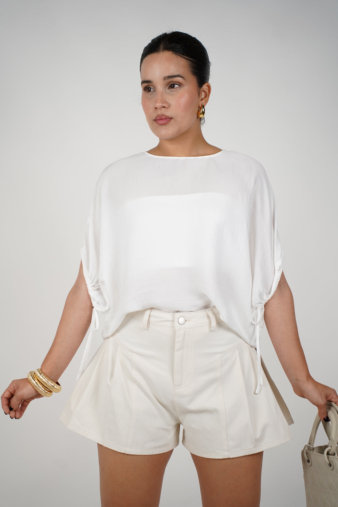 Dirae Pleated Mini Shorts – Light Olive High-Waisted Shorts with Tailored Detail