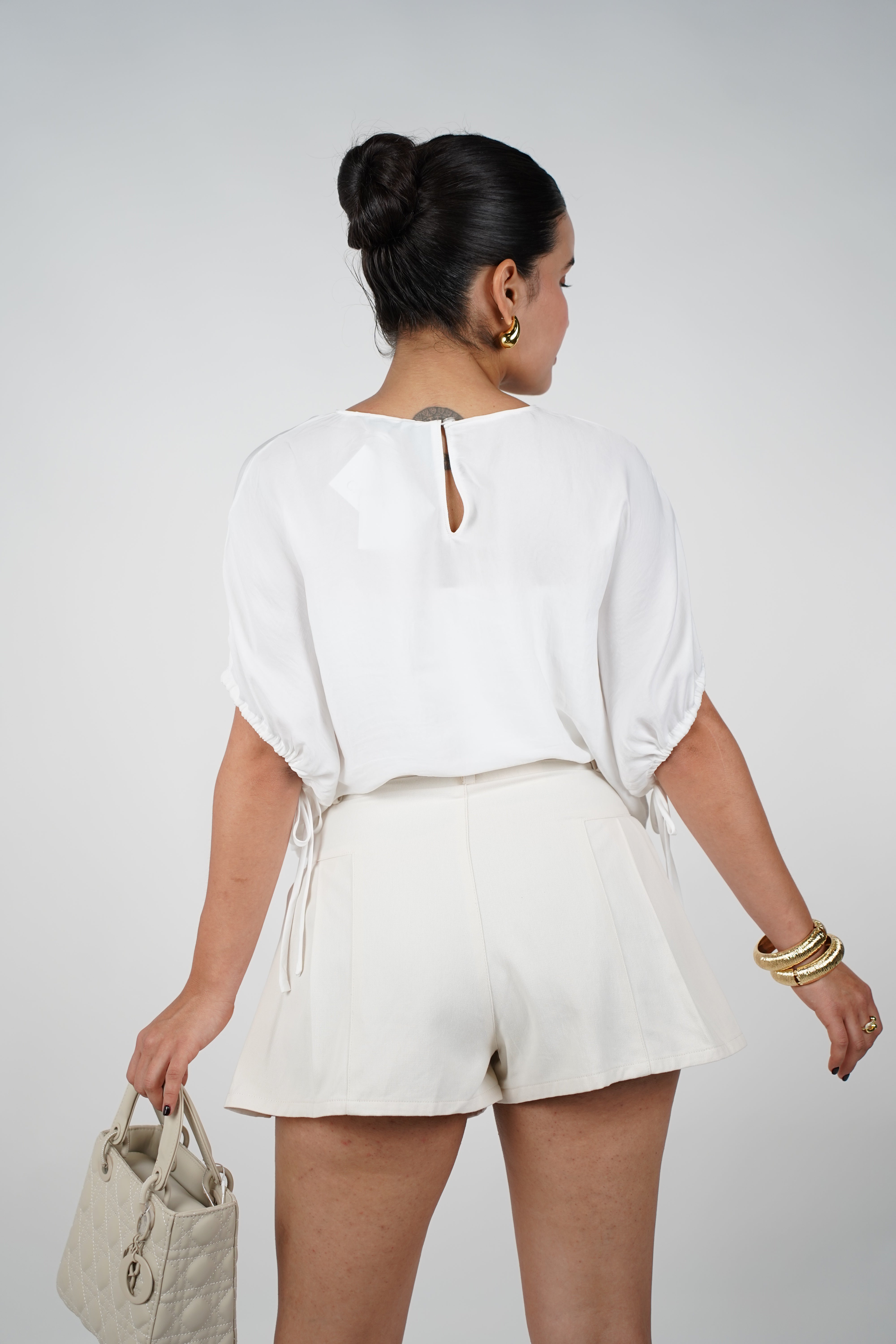 Dirae Pleated Mini Shorts – Light Olive High-Waisted Shorts with Tailored Detail