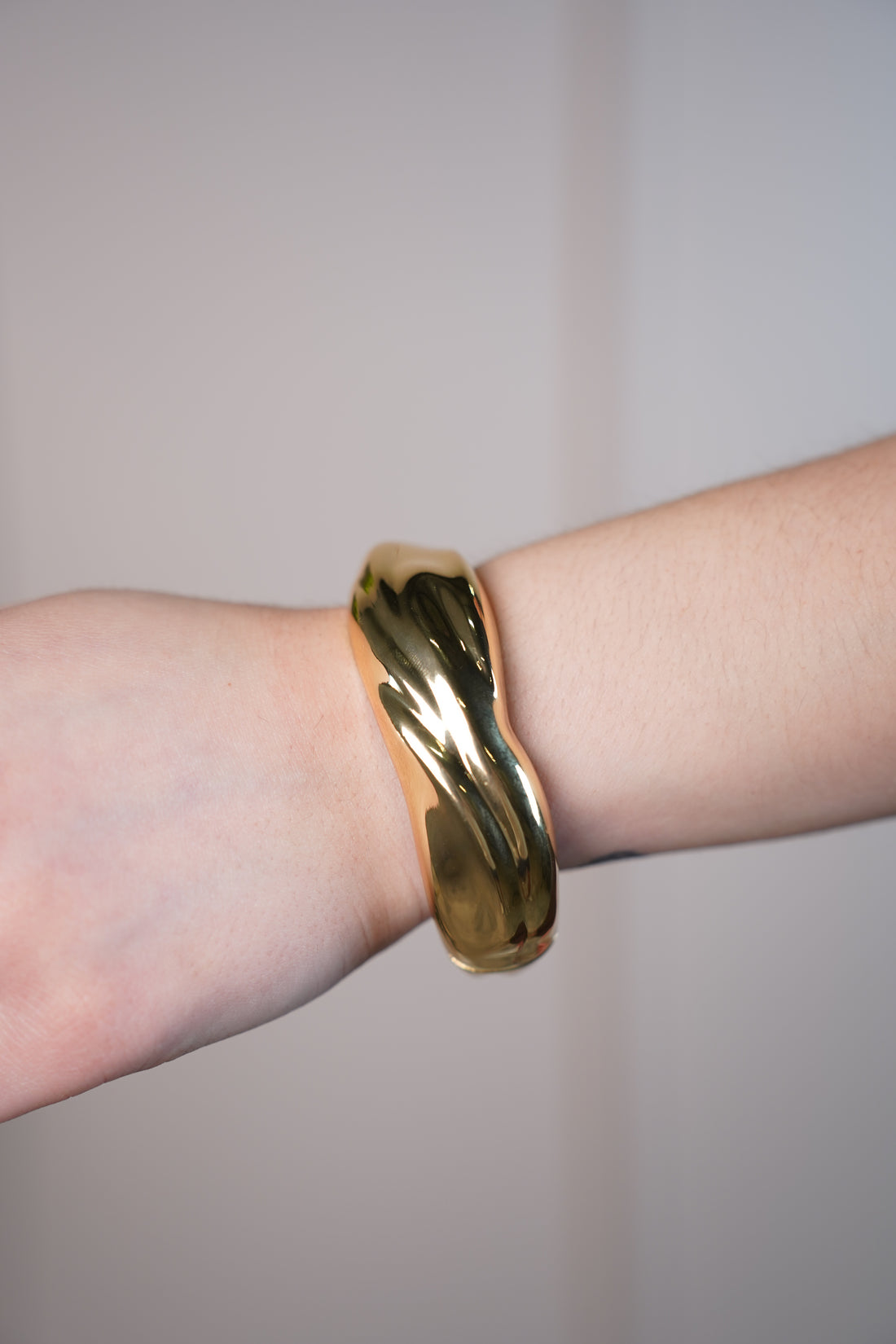 Haileycita Gold Sculptural Bracelet – Bold Statement Cuff with Modern Wave Design - Carema Boutique
