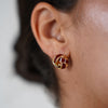 Yezel Knot Studs – Classic Twist with a Touch of Red