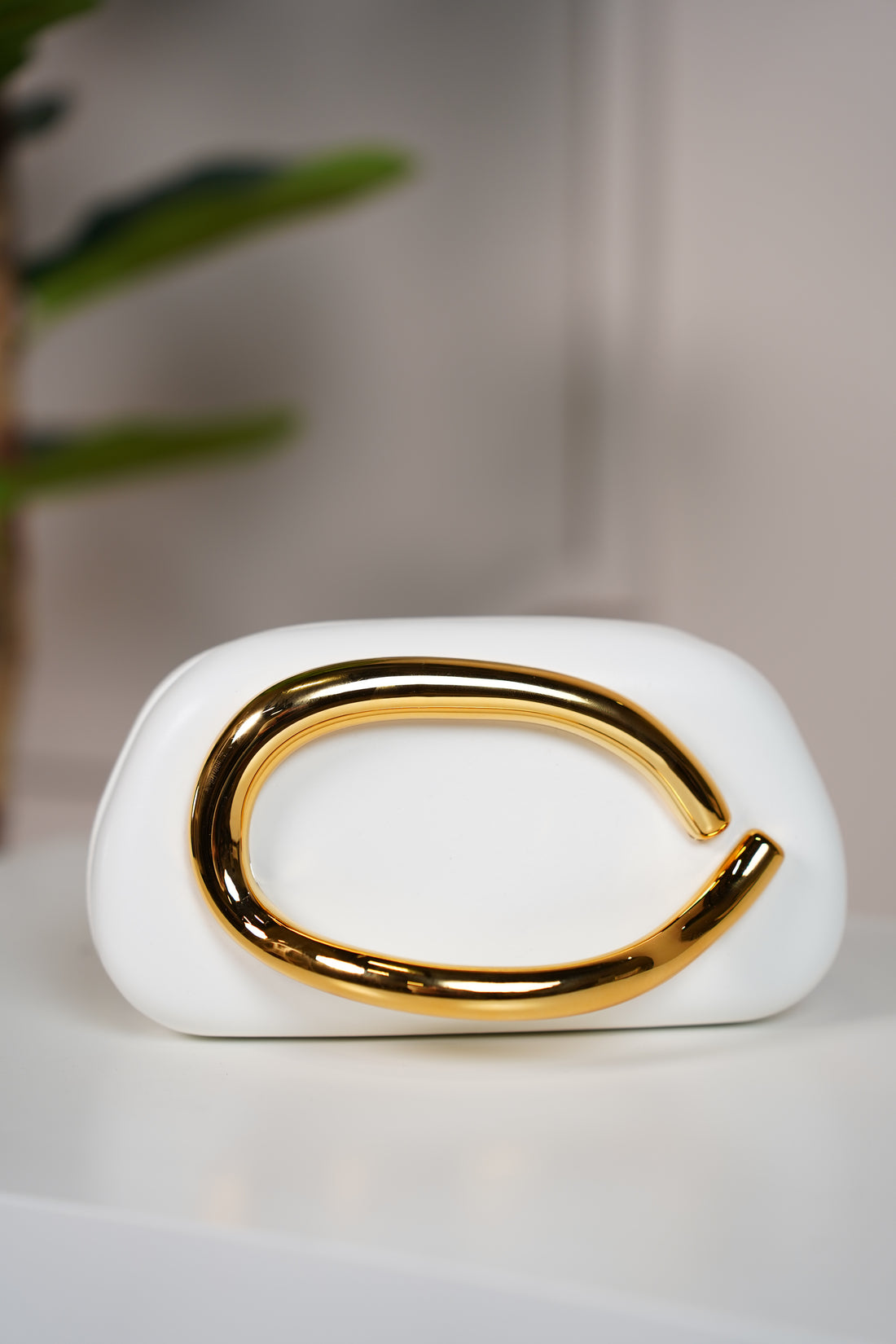 Zalia Trendy Clutch – Sculptural Elegance with a Bold Gold Accent