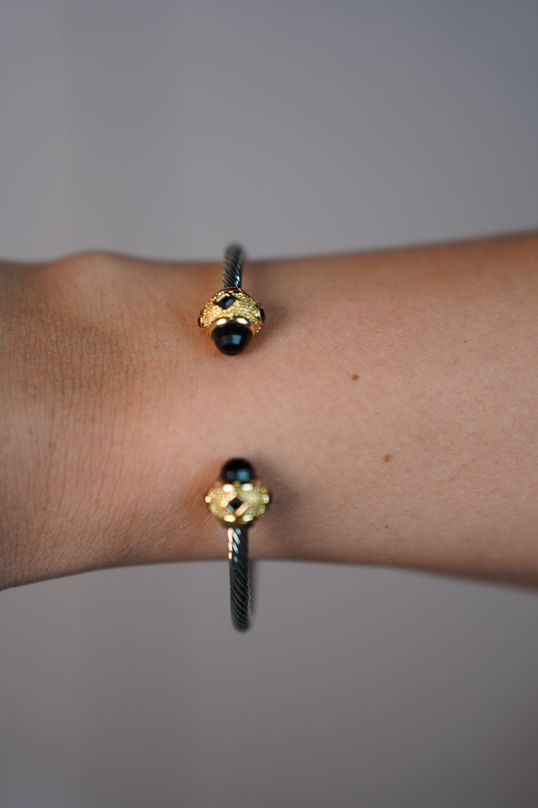 Kaia Twisted Metal Cuff Bracelet – Black & Gold