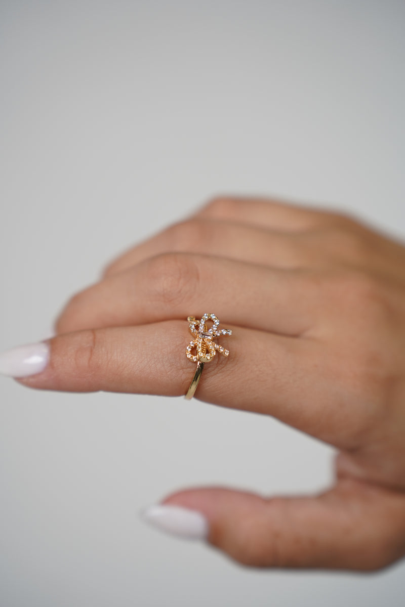 Sarei Mini Bow Ring – Dainty Crystal Bow Accent in Gold Finish