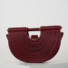 Osiris Clutch – Sculptural Half-Moon Bag