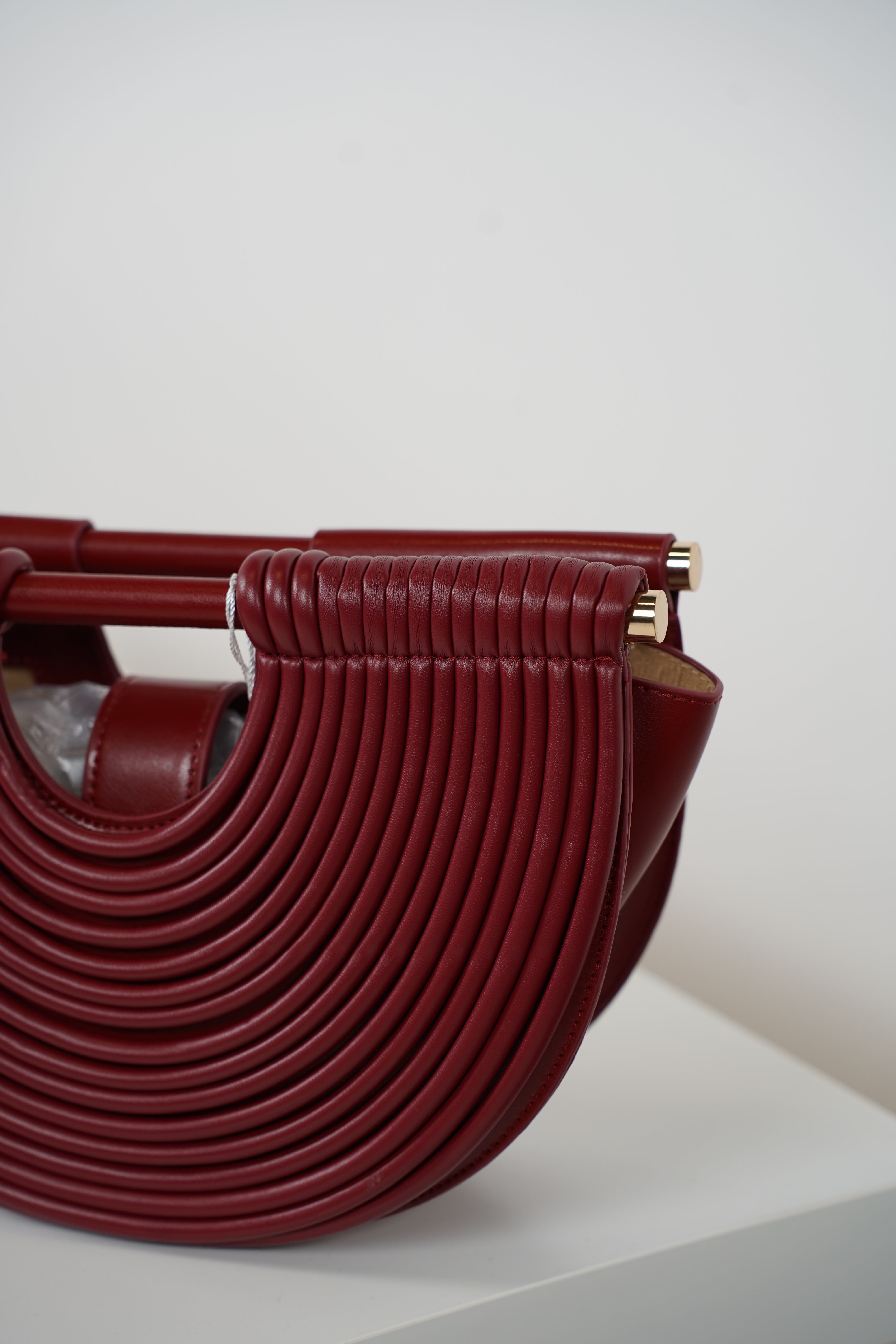 Osiris Clutch – Sculptural Half-Moon Bag