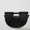 Osiris Clutch – Sculptural Half-Moon Bag