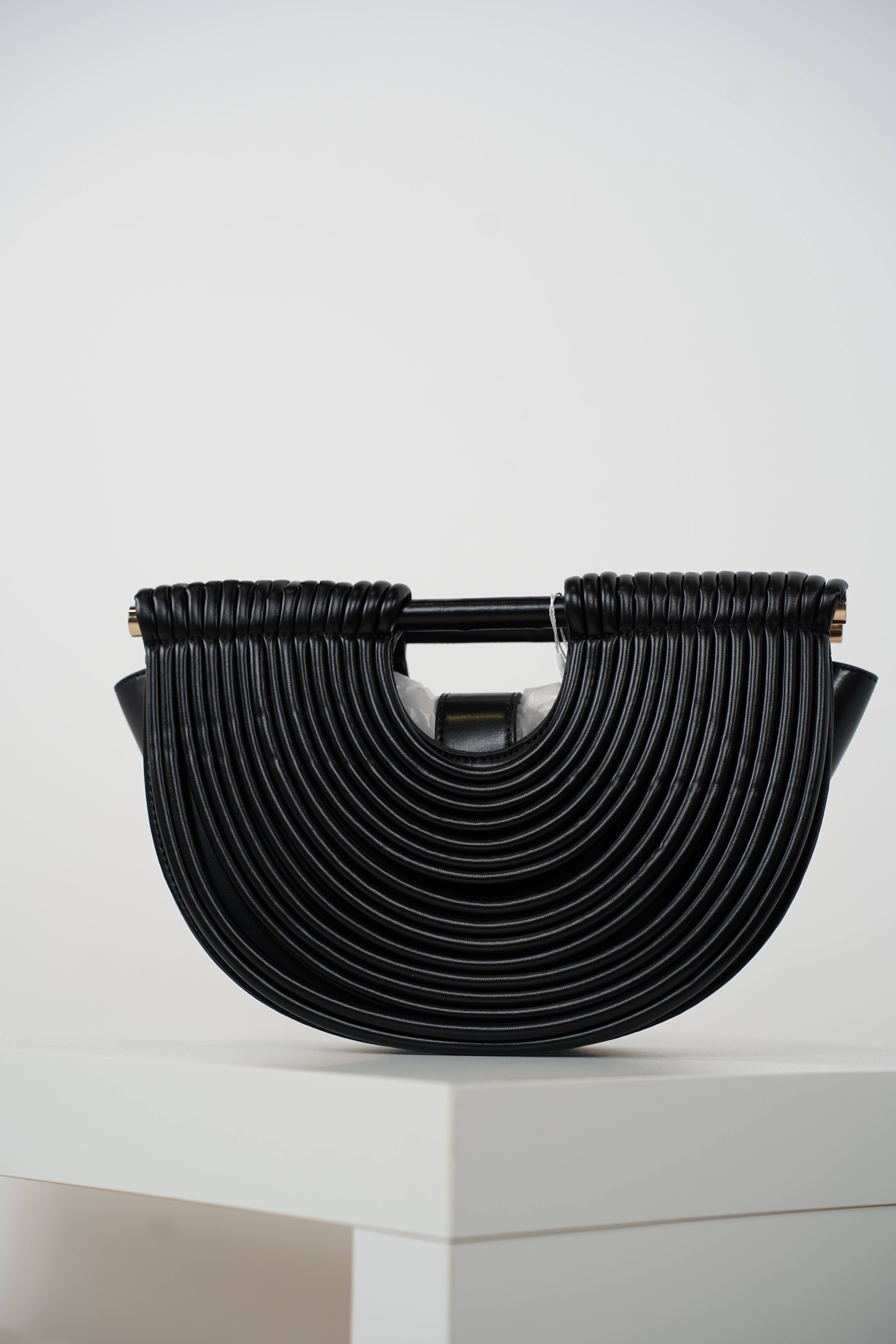 Osiris Clutch – Sculptural Half-Moon Bag