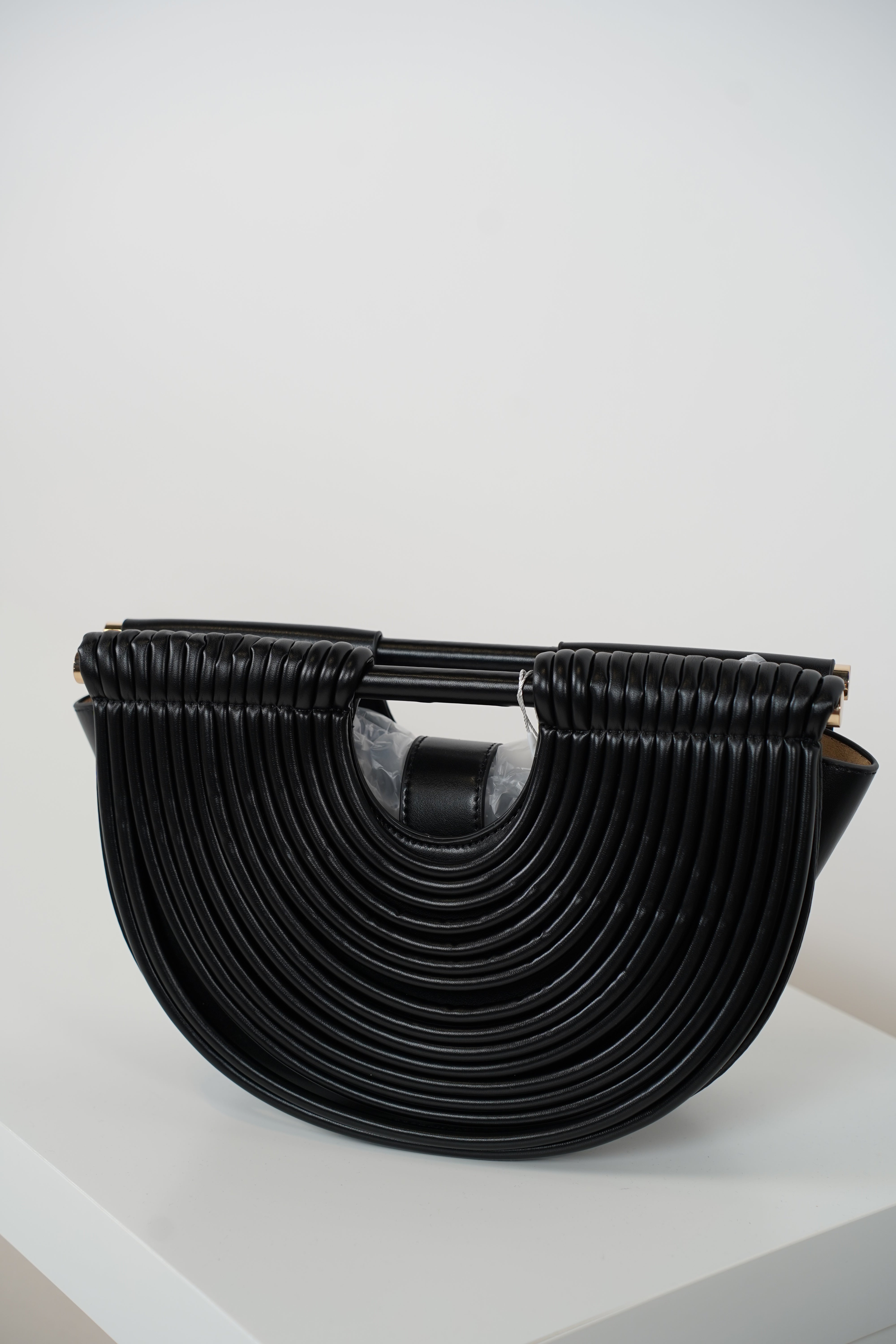 Osiris Clutch – Sculptural Half-Moon Bag
