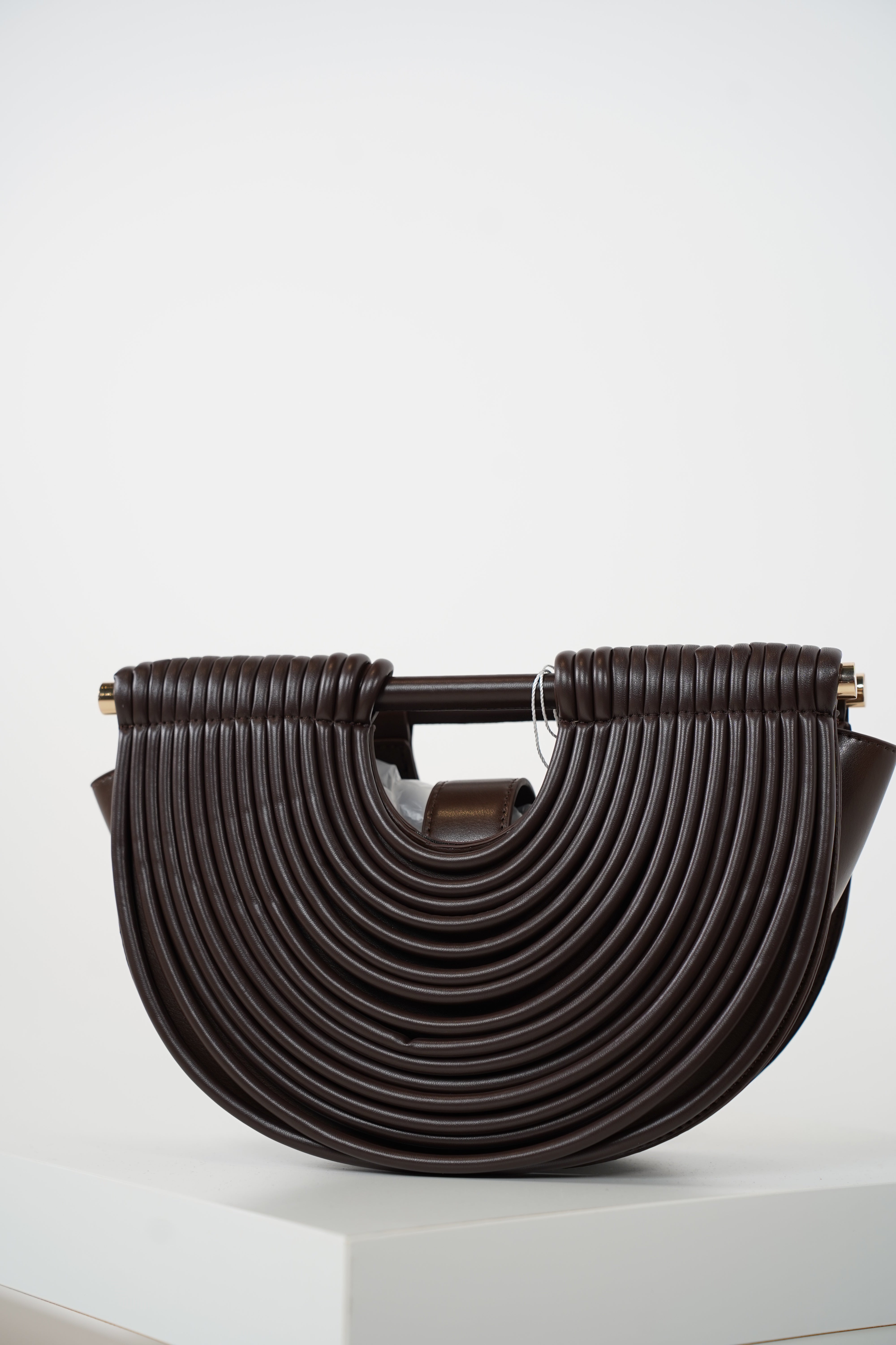 Osiris Clutch – Sculptural Half-Moon Bag