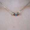 Lani Tear Necklace – Gold Snake Chain with Metallic Drop Pendants