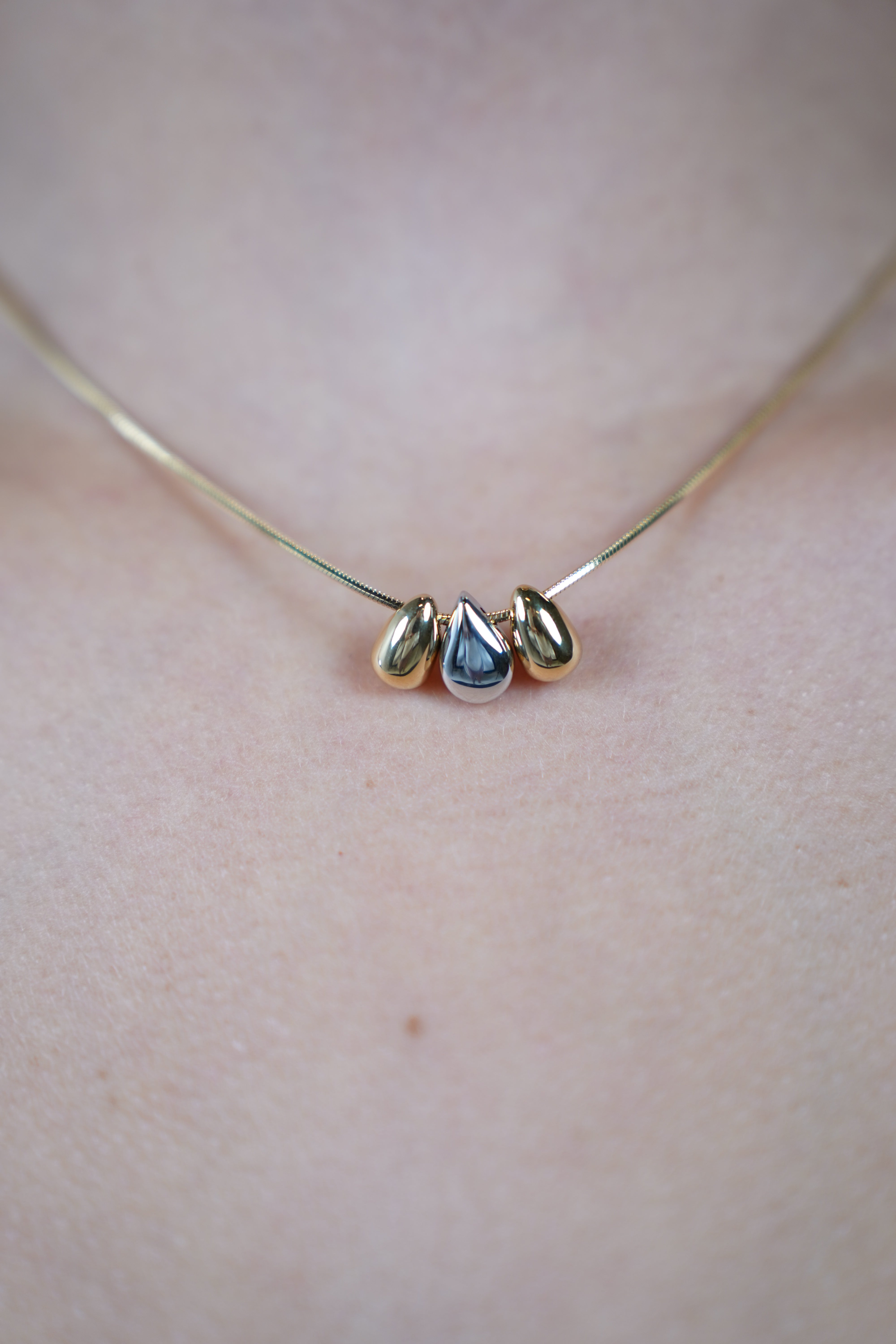 Lani Tear Necklace – Gold Snake Chain with Metallic Drop Pendants